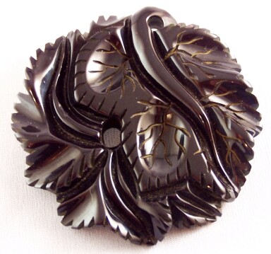 BP243 round black bakelite carved leaves pin